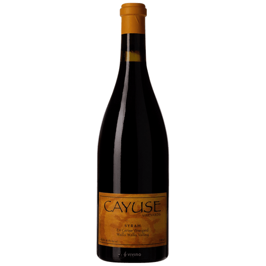 Bottle of 2010 Cayuse En Cerise Vineyard Syrah – biodynamic Walla Walla red wine with deep garnet color, flavors of roasted meat, black cherry, smoked herbs, and earthy complexity.