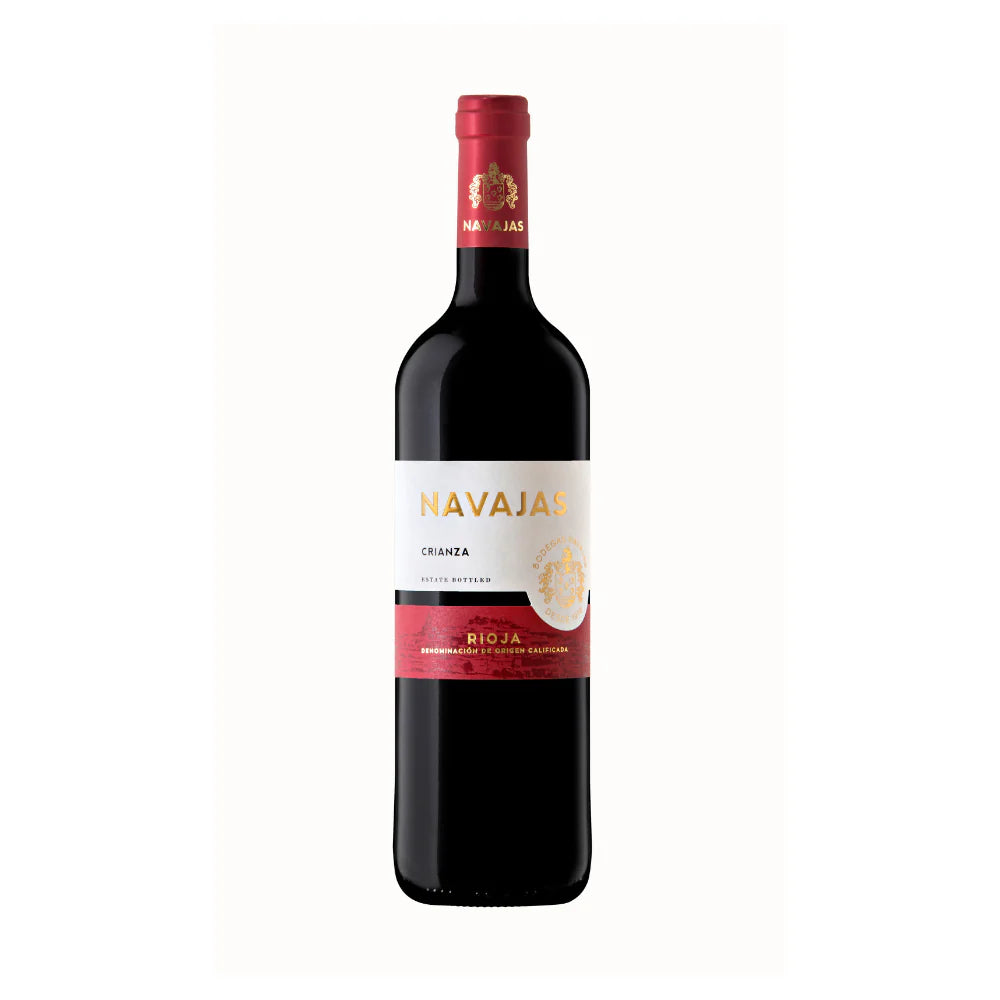 Bottle of Bodegas Navajas Graciano Crianza – single-varietal Rioja red with deep ruby hue, pictured with herbs, blackberries, and a hint of smoke on a rustic wood table.