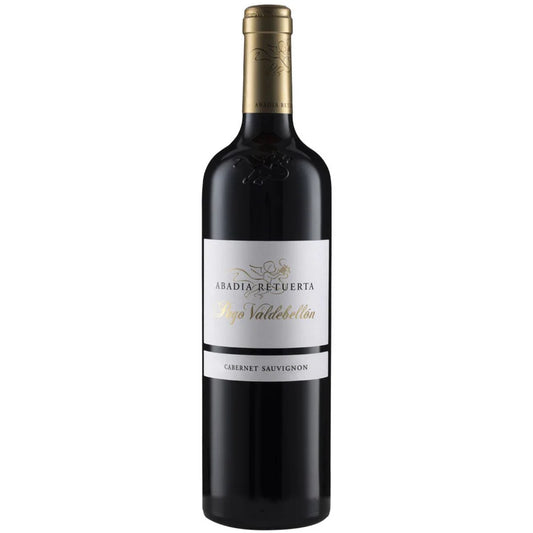 Bottle of Abadía Retuerta Pago Valdebellón 2019 – Spanish single-vineyard Cabernet Sauvignon from high-altitude limestone soils, set against slate and sage with notes of cassis and tobacco.