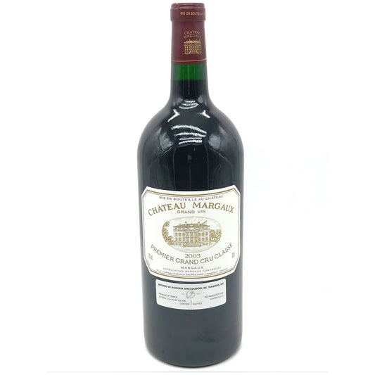 Bottle of Château Margaux 2003 – 99-point Bordeaux red wine with deep purple color, floral aromas, dark fruit, and elegant structure from Margaux.