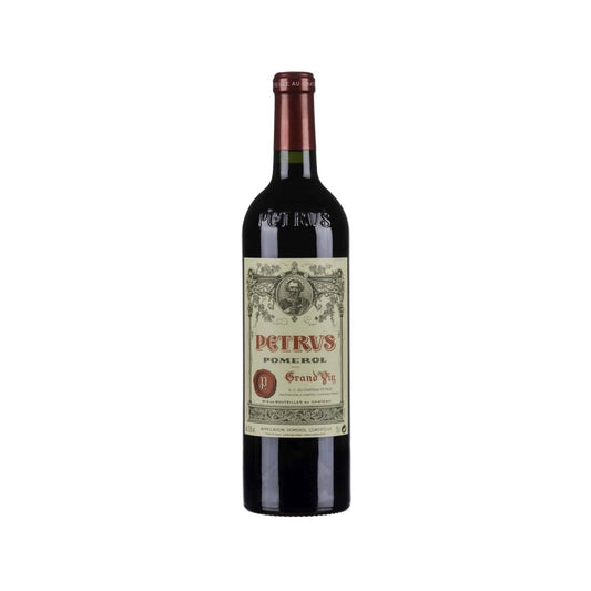 Bottle of Château Pétrus 2011 – iconic Bordeaux red wine with deep ruby color, Merlot elegance, and layered flavors of cherry, spice, and mulberries from Pomerol.
