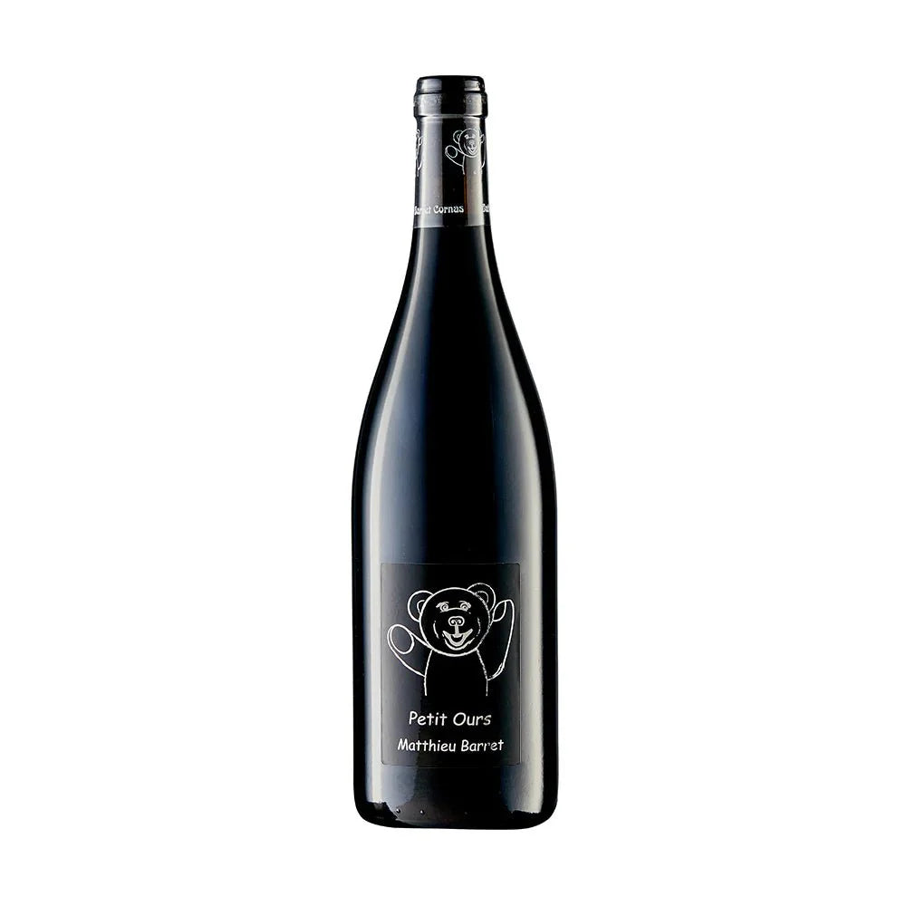 Bottle of Petit Ours Syrah 2022 by Matthieu Barret – deep purple organic Rhône red wine with bold wild berry aromas, crafted biodynamically in Côtes du Rhône, France.