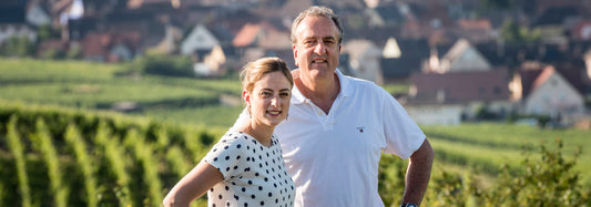 Father–daughter winemaking team from the Jean-Baptiste Adam winery in the Ammerschwihr vineyards, Alsace.