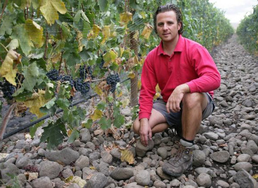 Christophe Baron among the cobblestone soils at Cayuse Vineyards