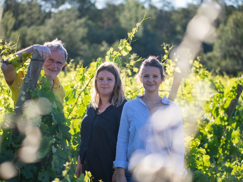 Jean-Benoît Cavalier with Marie and Maguelone Cavalier in the vineyards at Château de Lascaux in Pic Saint-Loup, Languedoc — image courtesy of Château de Lascaux