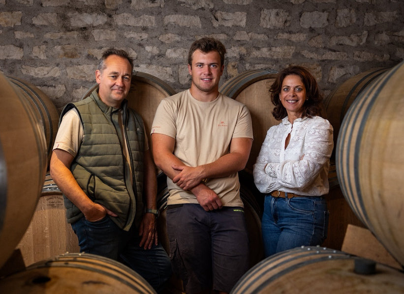 Alex Moreau with family in the cellar in Chassagne-Montrachet