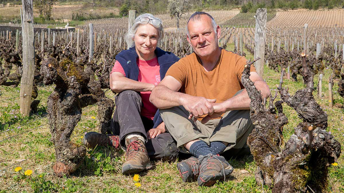 Hélène and Laurent Martelet of Domaine Comtesse de Chérisey in their Blagny vineyard in Burgundy — image via Sotheby's Wine