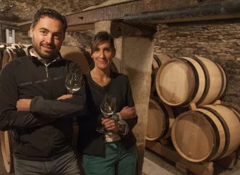 Etienne Sauzet cellar with wine barrels