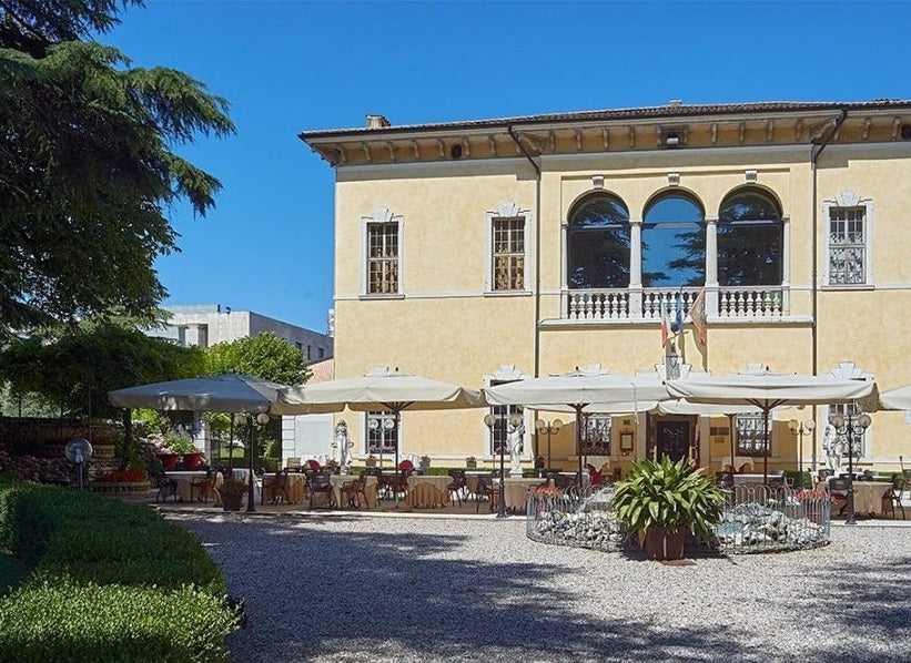 Historic Italian estate building and garden courtyard