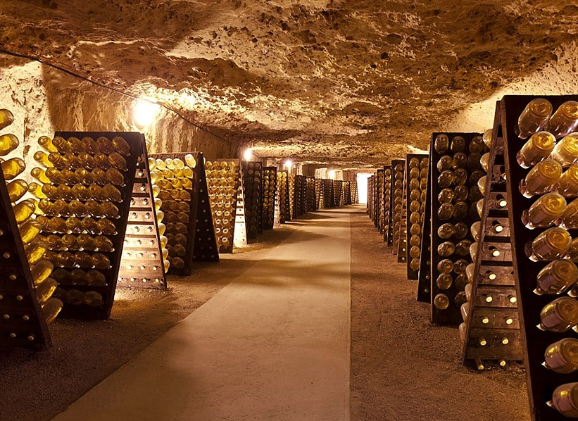Bottle racks in the Grandes Caves Saint Roch of Maison Lacheteau, Loire Valley