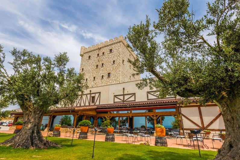 Pago de Cirsus estate and stone tower at Finca Bolandin in Navarra, Spain — image via Turismo de Navarra