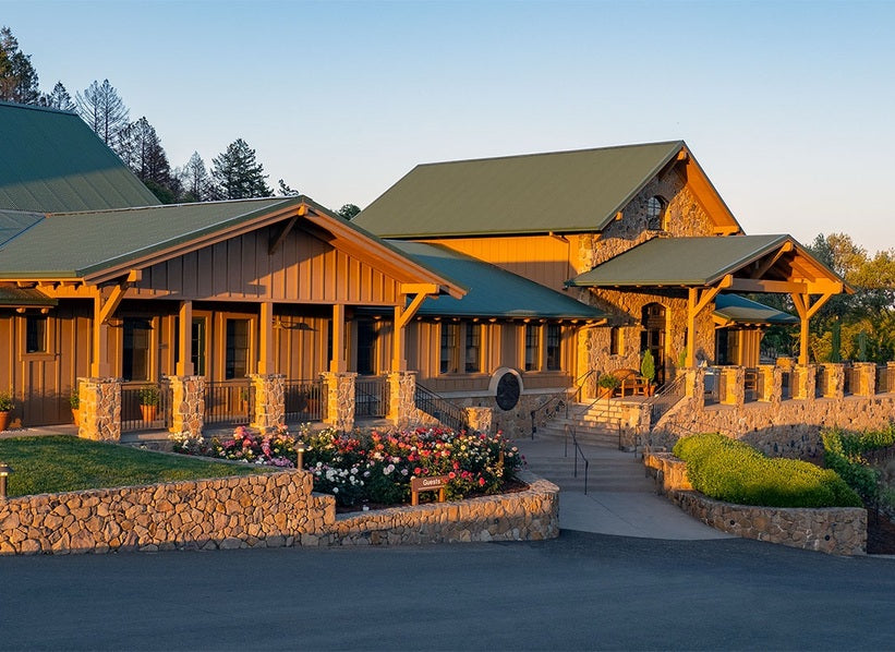 Pride Mountain Vineyards winery buildings with stone terraces and warm evening light